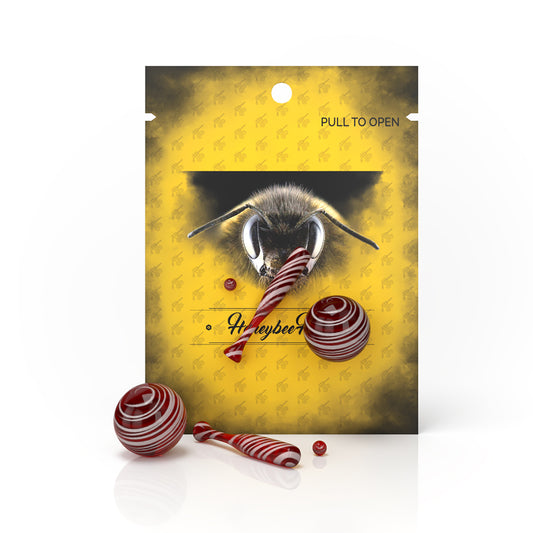 Dab Baseball Set - Red: A package featuring glass baseball inserts and marbles, designed to enhance airflow and vaporization for efficient dabbing.