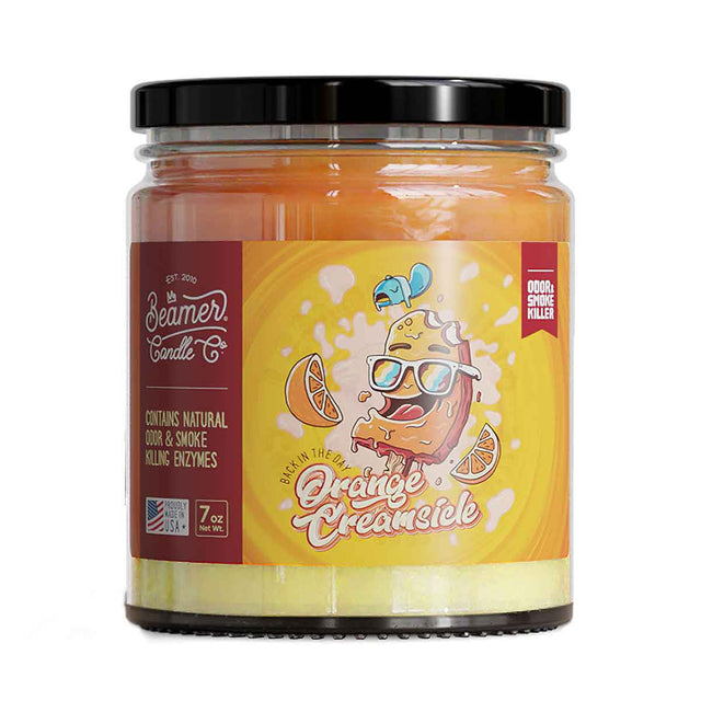 Scented Candle - Orange Creamsicle in a mason jar, featuring a lid. Offers 55-hour burn time with odor-eliminating enzymes for a fresh environment.