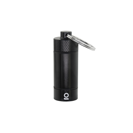 Small Storage Key Chain: Black cylinder with a ring, airtight, waterproof, durable aluminum construction, featuring a screw-on cap with rubber O-ring for odor control.