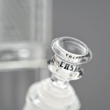 18 Glass Beaker Bong - Lines, featuring a close-up of a sturdy glass bottle with etched patterns, showcasing its elegant design and premium borosilicate construction.