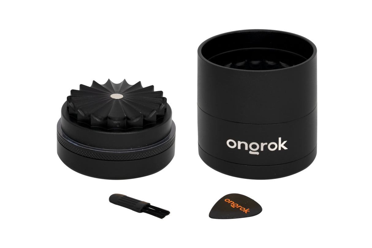 Mini 5 Piece Flower Petal Toothless Grinder with Storage, featuring a cylindrical design with logo, integrated storage, and ergonomic handle for consistent grinding.