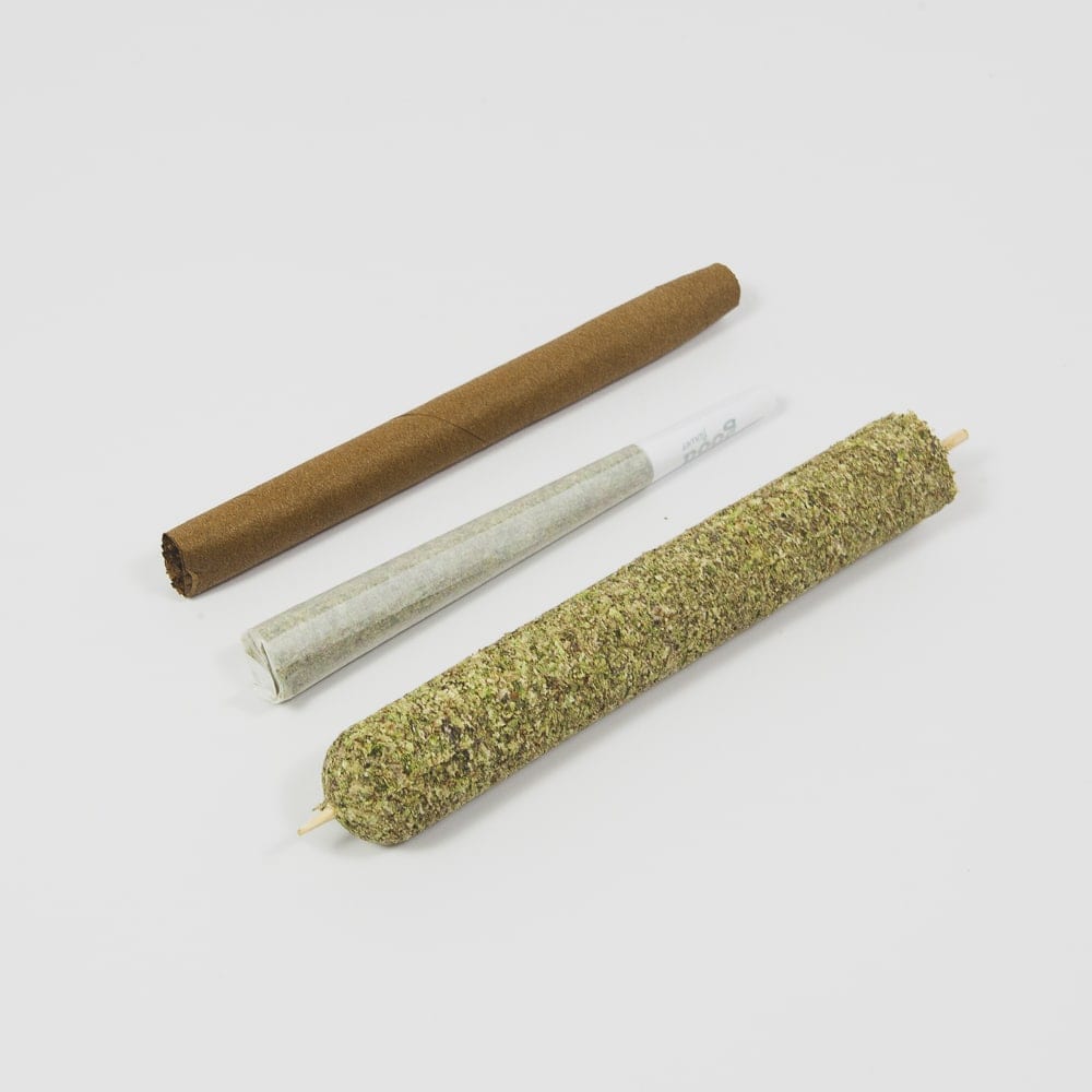 Large CannaMold - Fits 7-14g, shown with cigarettes for size comparison, designed for crafting slow-burning, tightly packed cannagars with built-in airflow hole.