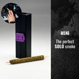 Mini CannaMold with purple handle, designed for creating slow-burning cannagars, includes packing tool and skewers for seamless smoking experience.