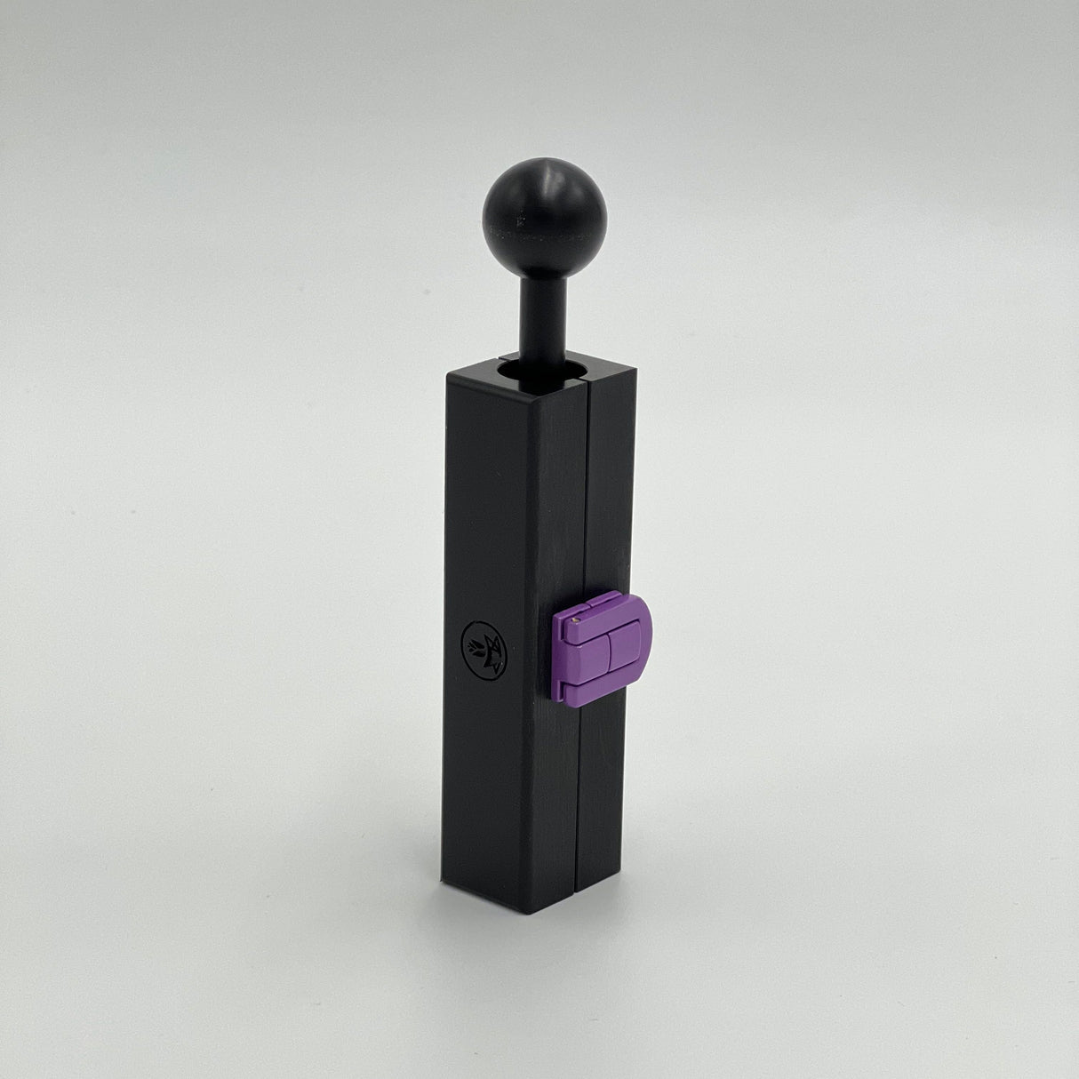 Mini CannaMold - Fits 1-2g, featuring a black rectangular form with a purple handle, designed for crafting slow-burning cannagars with integrated airflow for smooth draws.