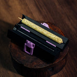 Personal CannaMold - Fits 2-4g, shown as a compact rolling device with a green stick inside, designed for creating slow-burning, tightly packed cannagars.