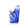 Bubbler - Wedge - Light Cobalt, a compact, ergonomically designed glass bong with rounded corners, ideal for versatile use with flowers and concentrates.