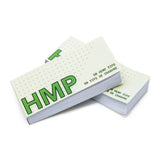 Rolling Paper Tips - Pack of 50, featuring a stack of white and green booklets, designed for perfect filter perforation, complementing rolling papers.