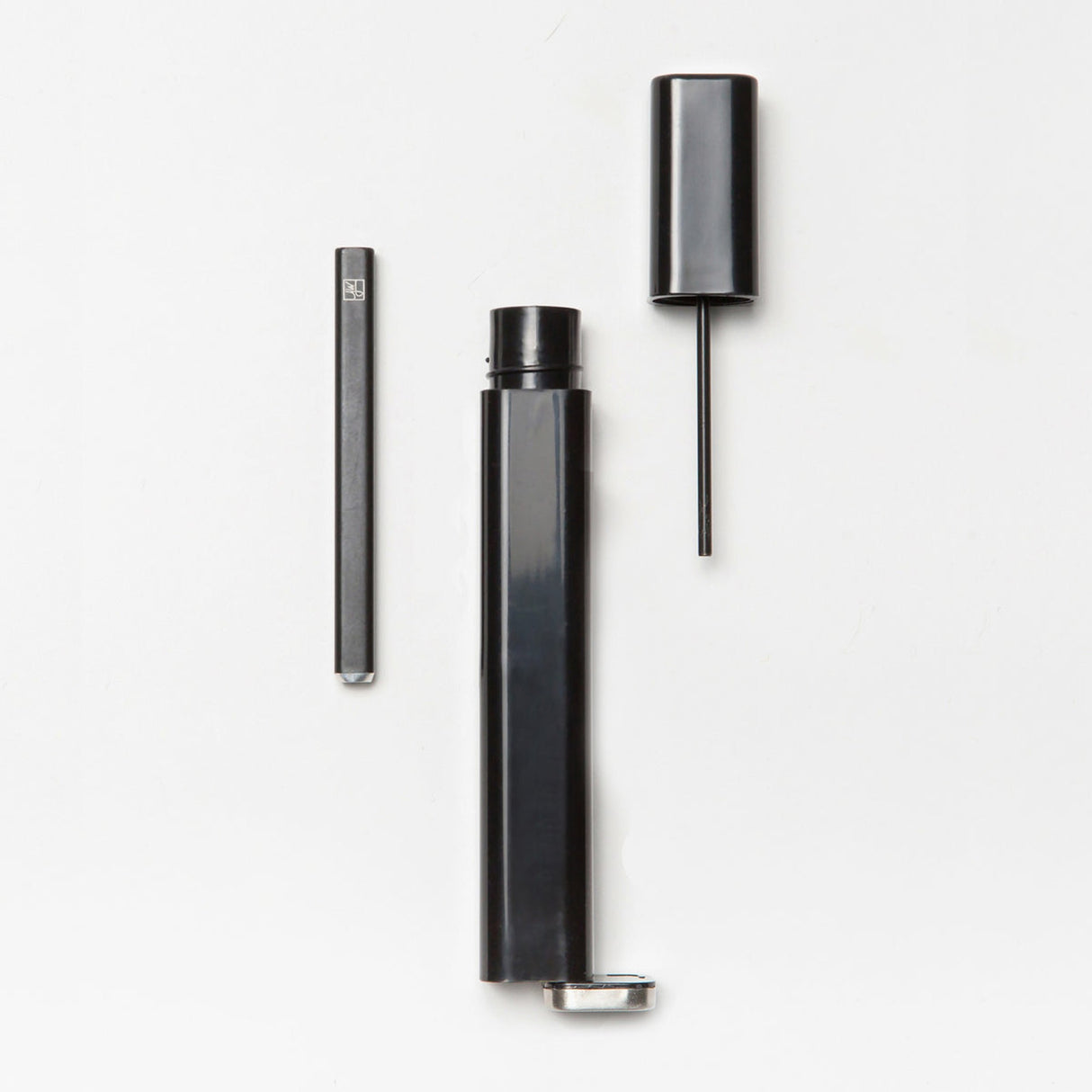 Wand Dugout & One Hitter, a sleek black tube with included screwdriver and pencil-like tools, offering discreet flower storage and smoking features in one compact design.