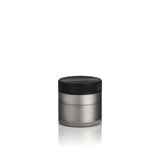 Kannastör 4pcs Aluminum 1.5 Solid Body Grinder, a sleek round metal cylinder with a secure black top, designed for efficient and precise herb grinding.