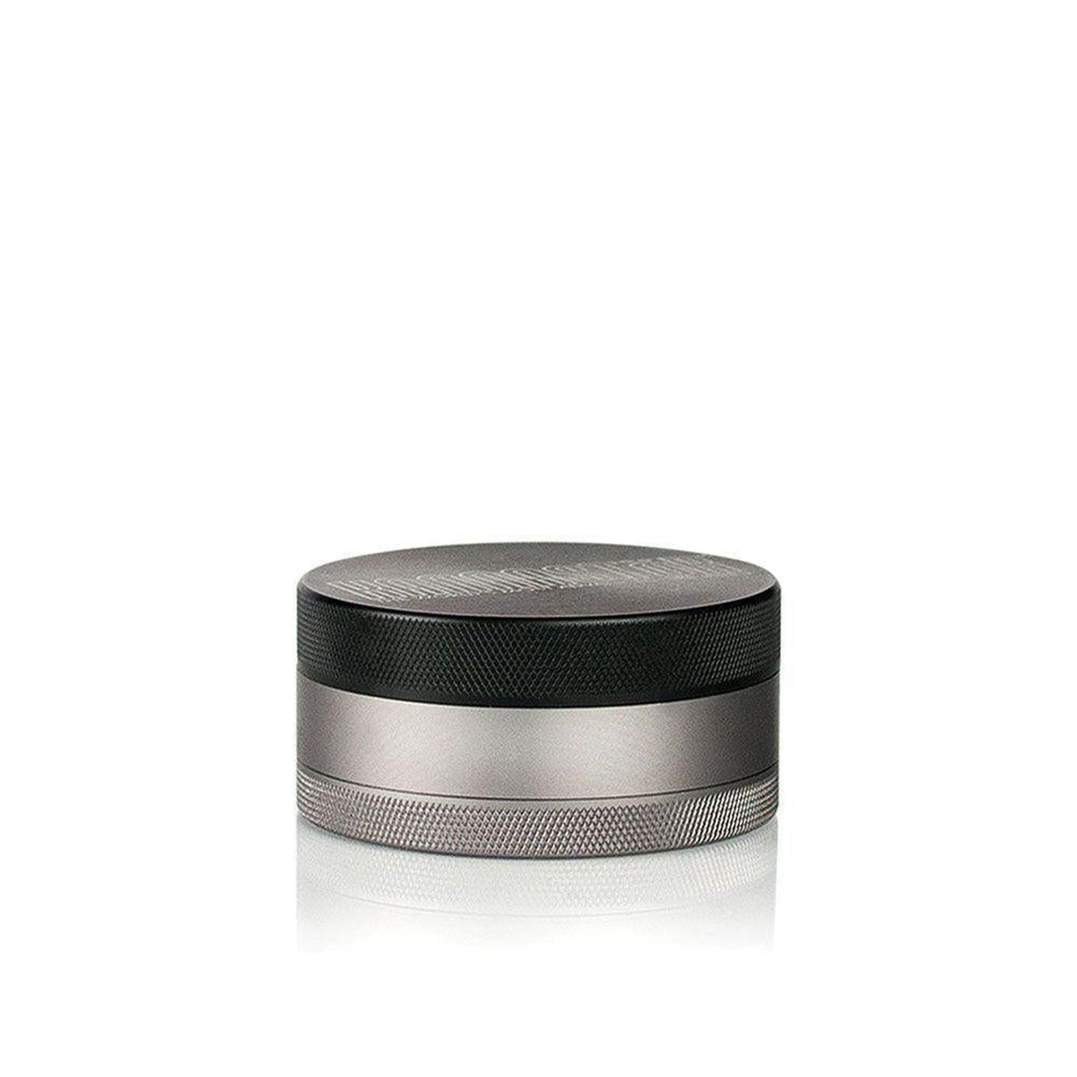 Kannastör 4pcs Aluminum 2.5 Solid Body Grinder with Storage, featuring a round metal design with a black and silver band, ideal for portable use.