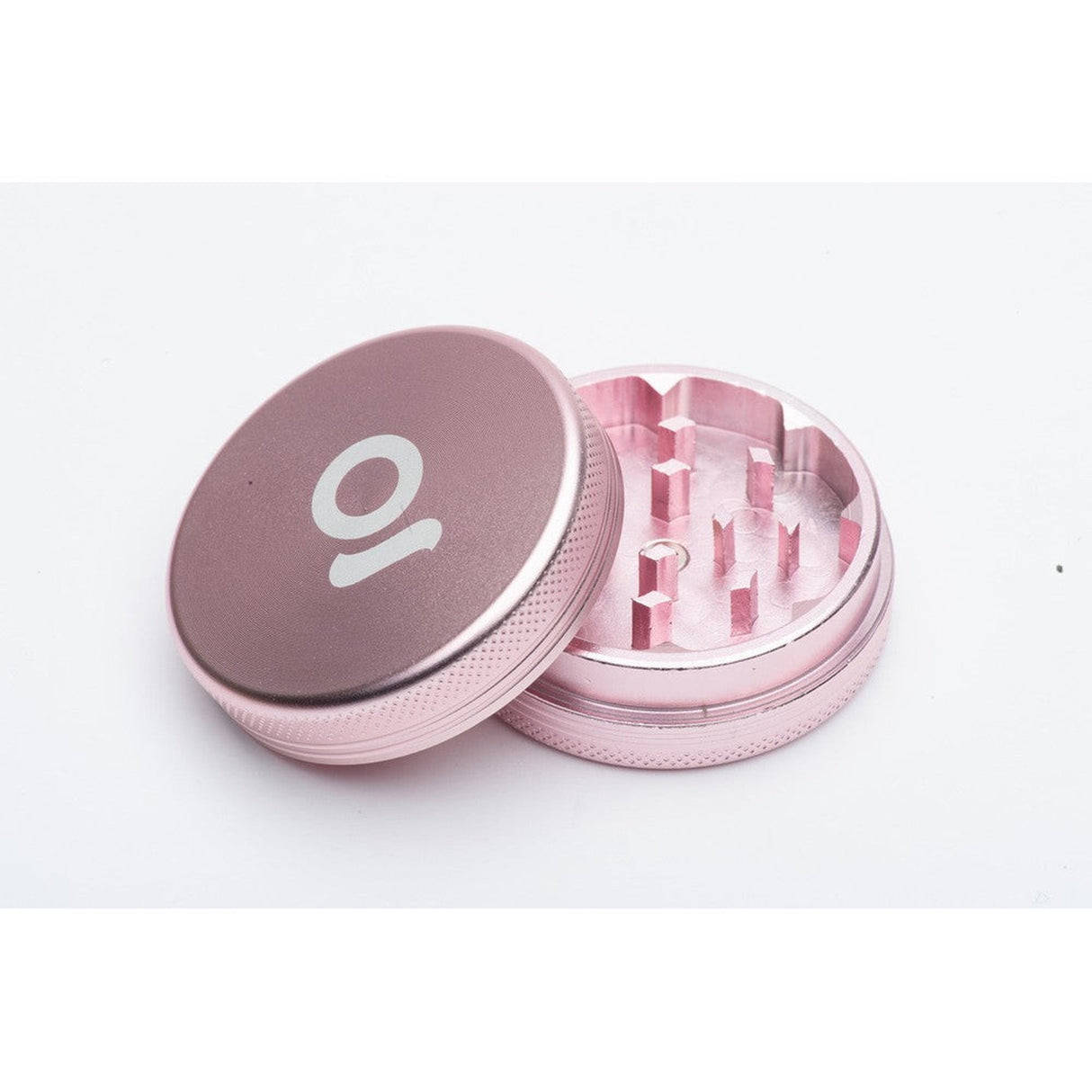 Pink metal 2pcs grinder with white logo, featuring a compact design and precision-engineered teeth for a medium-to-fine grind, crafted from aircraft-grade aluminum.