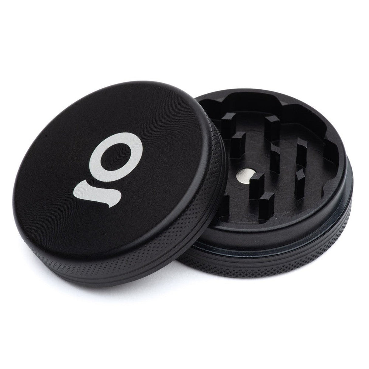 2pcs Metal 2 Magnetic Grinder, featuring a black circular design with a white logo, crafted from durable aircraft-grade aluminum for efficient herb grinding.