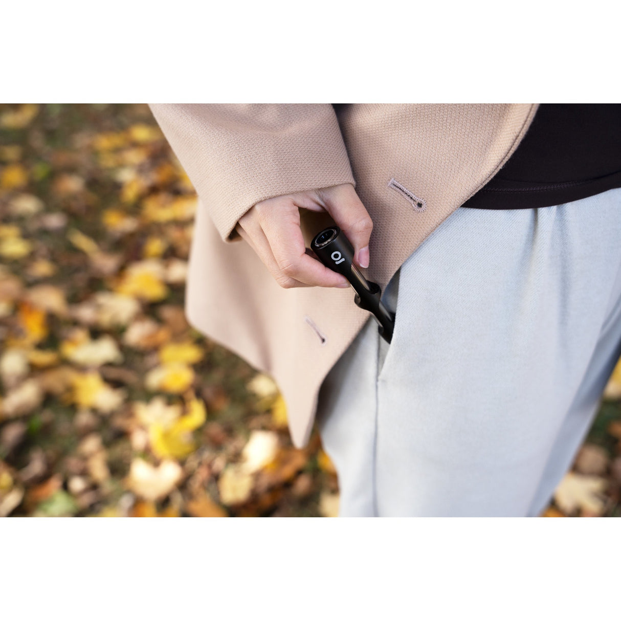 Person holding the Aluminum & Glass Chillum One Hitter in pocket, highlighting its portability and discreet design for convenient, on-the-go smoking sessions.