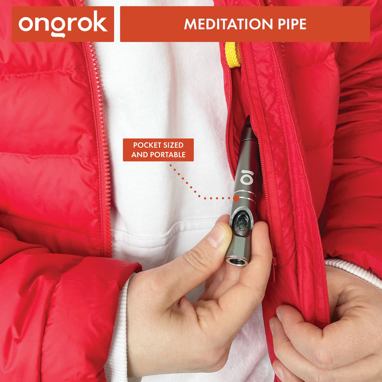 Person discreetly holding the ONGROK Aluminum Hash Pipe, showcasing its compact, sleek design, ideal for meditation and relaxation sessions.