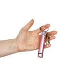 Hand holding the Aluminum Smell-Proof Storage Keychain, showcasing its compact, durable design ideal for discreetly storing consumables like herbs and capsules.