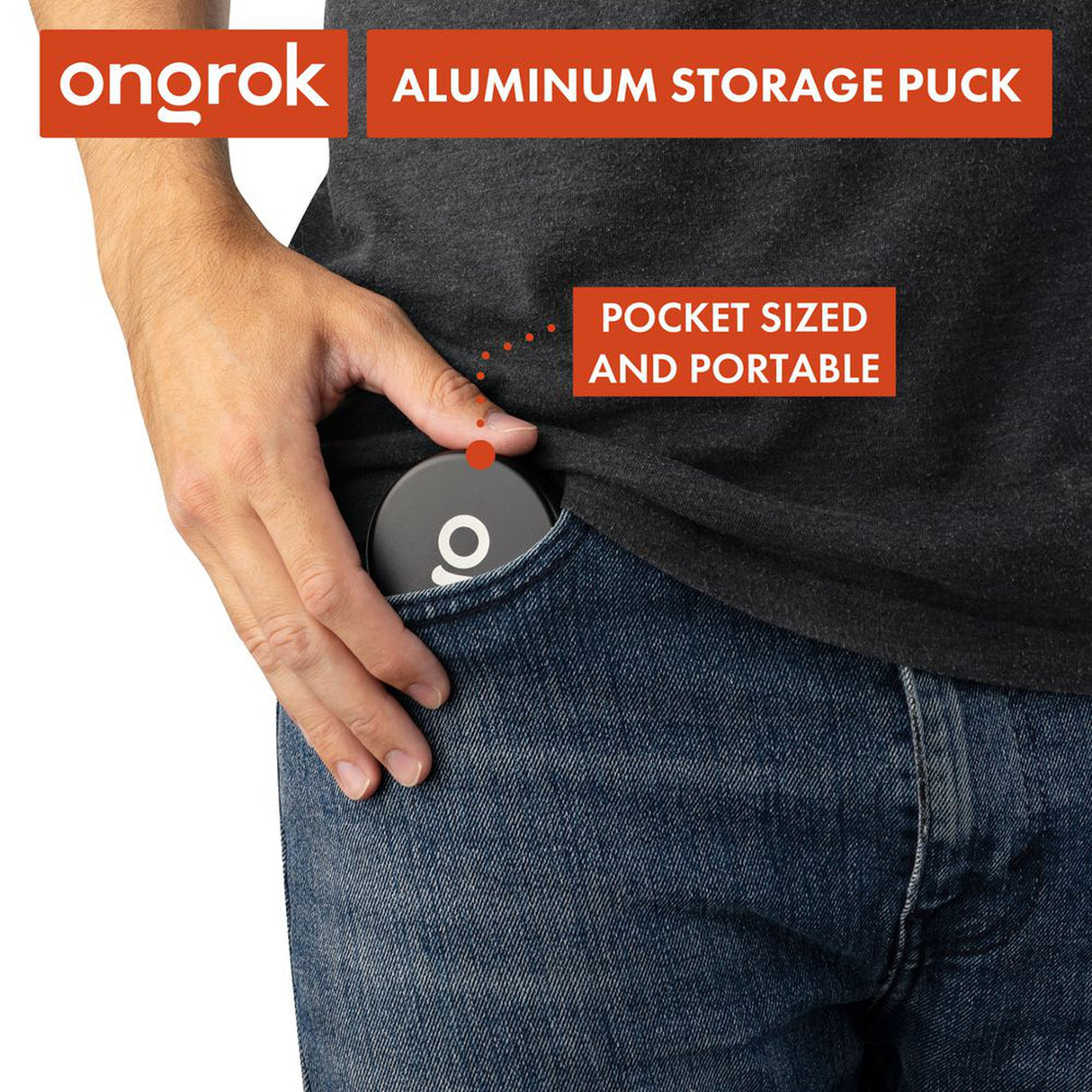 A person places a pocket-sized Aluminum Storage Puck into their jeans pocket, illustrating its portability and discreet design for on-the-go item storage.