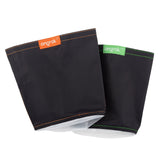 Botanical Infuser Kit - Large, featuring black and white bags, with close-up of a green tag and black fabric with orange stitching, essential for herb infusion.