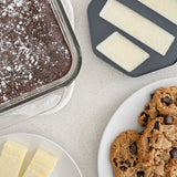 Botanical Infuser Kit - Small: Plate of chocolate chip cookies suggests use of infused butter, aligning with infuser's purpose for culinary creations.