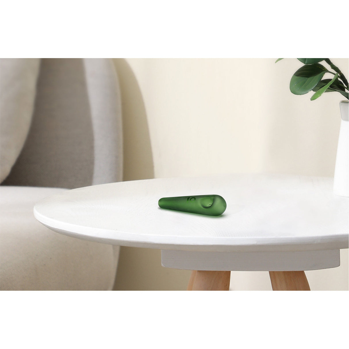 Glass Pipe - Frosted Teardrop Spoon, shown on a white table, crafted from high-quality borosilicate glass with a unique teardrop design and stable feet.