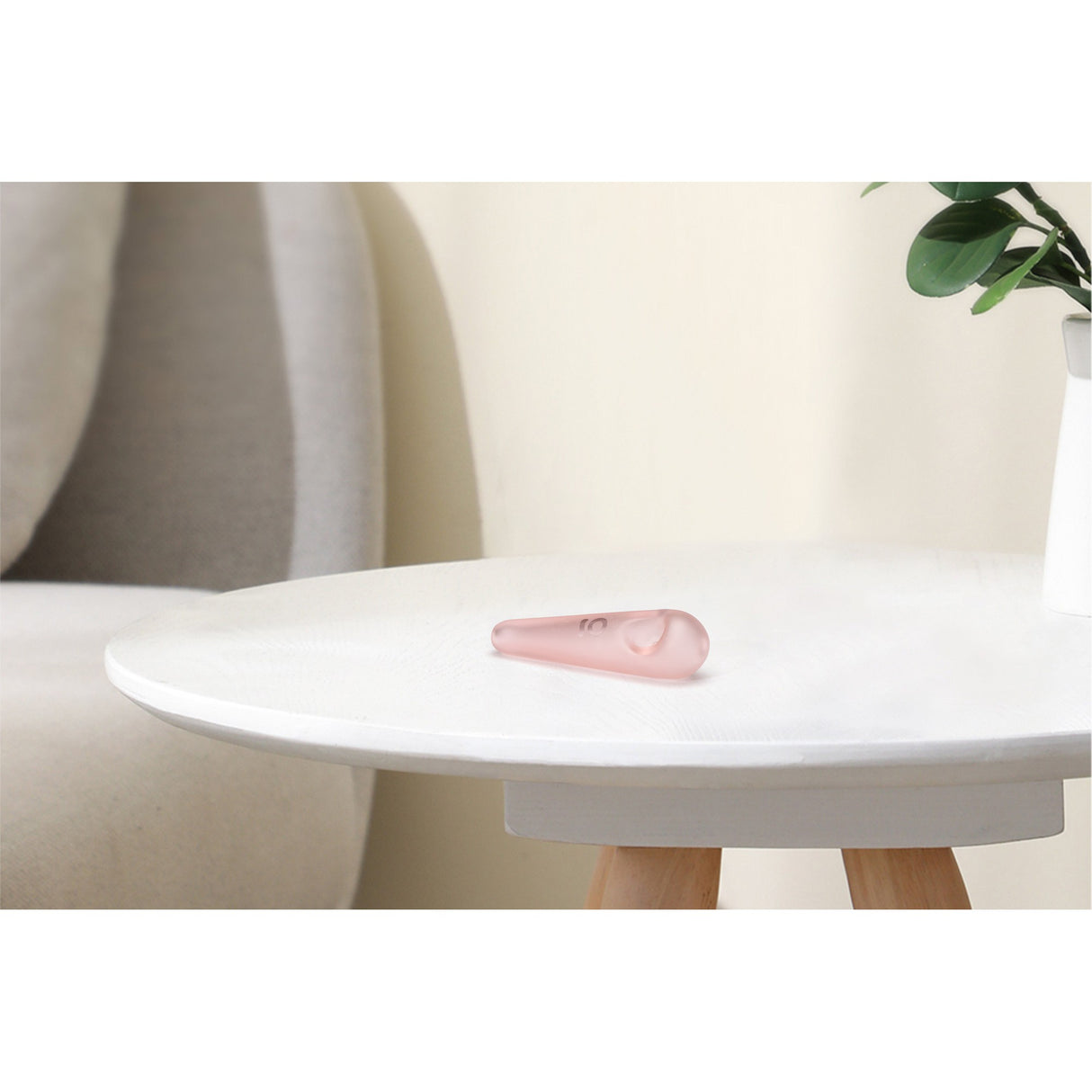 Glass Pipe - Frosted Teardrop Spoon on a white table, showcasing its elegant teardrop design and stable feet for enhanced functionality and durability.