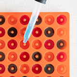 Silicone Gummy Molds & Dropper Kit - Set of 3, featuring a pipette and colorful trays for easy candy creation and spill-free liquid infusion.