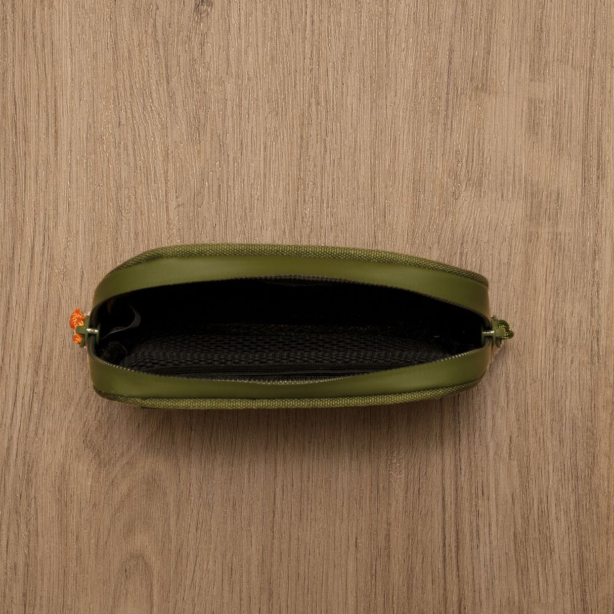 Smell Proof Water-Resistant Wallet with a visible waterproof zipper, designed for odor control and security, displayed on a wooden surface.