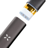 Close-up of the PAX Era Life Oil Extract Vaporizer, highlighting its sleek, compact design with a USB charger for convenient, portable vaping.