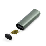 PAX Plus Dry Herb Vaporizer featuring a sleek, compact design with a dual-use device and visible mouthpiece, ideal for on-the-go vaping.