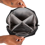 PAX Smell Proof Bag - Medium, shown being held, designed for discreet cannabis storage with smell-proof technology, customizable dividers, and water-resistant material.