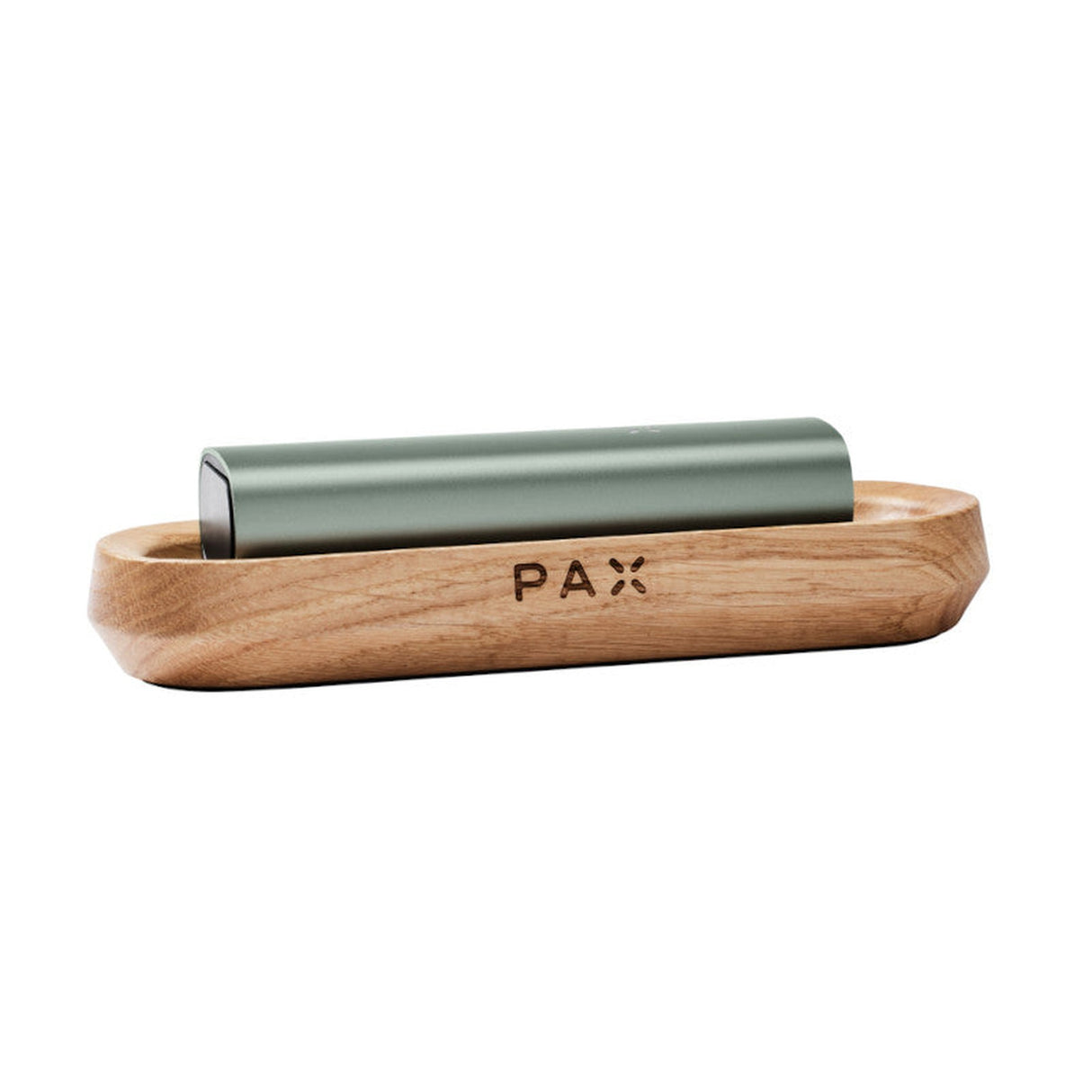 PAX Wood Charging Tray shown with a sleek, modern design, featuring a wooden base and a green object, perfect for charging PAX vaporizers stylishly.