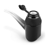 Proxy Concentrate Vaporizer - Black features a sleek design with a central pipe, a round button interface, and includes essential tools for enhancing concentrate sessions.