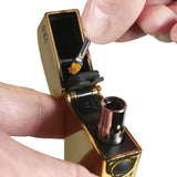 Person holding RYOT 710 FLIP Oil Battery Kit with visible dab tool and metal object, emphasizing its versatile use for wax concentrates and 510 carts.