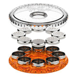 Dosing Capsule Magazine with clear and orange container, silver metal holes, designed for pre-filling and storing vaping capsules for efficient herb sessions.