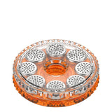 Round container with multiple holes, part of the Dosing Capsule Magazine, designed for storing pre-filled herb capsules for vaping convenience and efficiency.