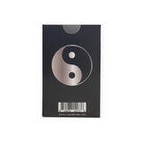 Grinder Card - Yin Yang: A sleek, compact herb grinder with a yin yang symbol, designed for easy wallet storage and efficient, portable grinding.