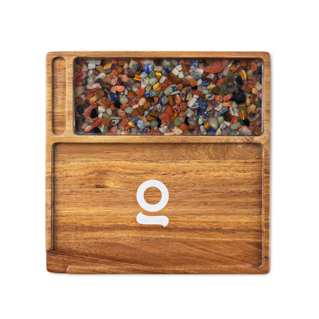 Premium Natural Acacia Wood Rolling Tray featuring colorful rocks, showcasing unique wood markings and a minimalist design with a convenient discard corner for organized storage.