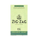 Zig-Zag 1 1/4 Hemp Rolling Paper, featuring organic, unbleached hemp fibers, with a prominent logo on the box, ideal for eco-friendly smoking.