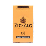 Zig-Zag 1 1/4 Orange Rolling Paper box, showcasing premium natural flax fibers and slow-burning quality, ideal for a smooth, consistent rolling experience.