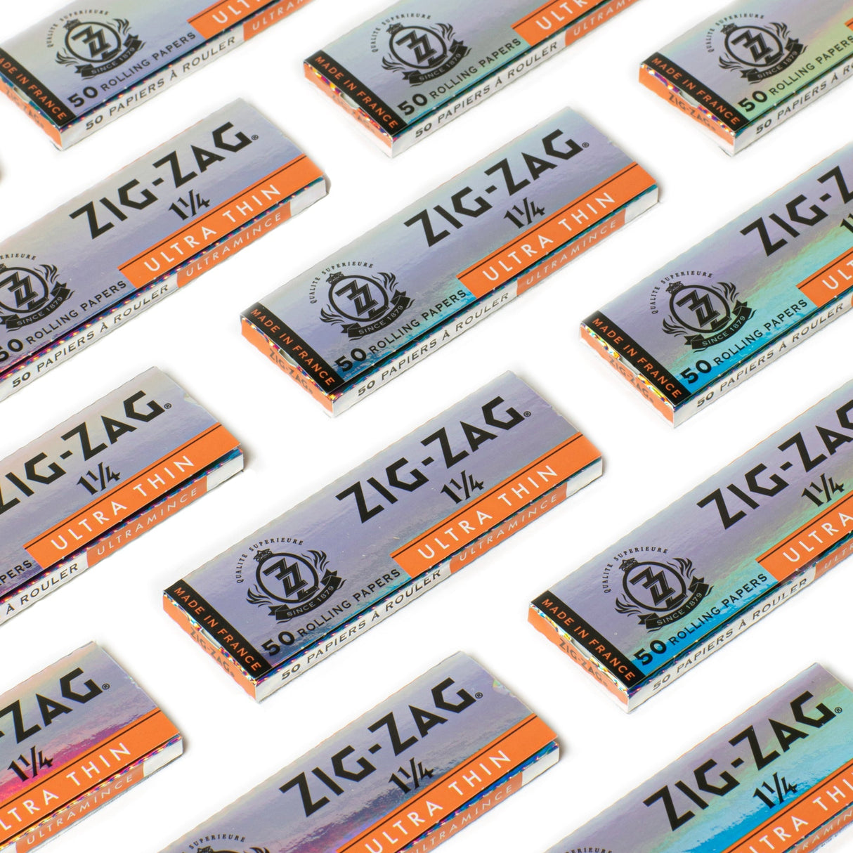 1 1/4 Ultra Thin Rolling Paper packs, showcasing Zig-Zag's translucent, lightweight design for a superior, slow-burning smoking experience, emphasizing durability and elegance.