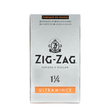 Zig-Zag 1 1/4 Ultra Thin Rolling Paper, featuring a white box with black text and logo, known for its translucent, lightweight design ensuring a slow, even burn.