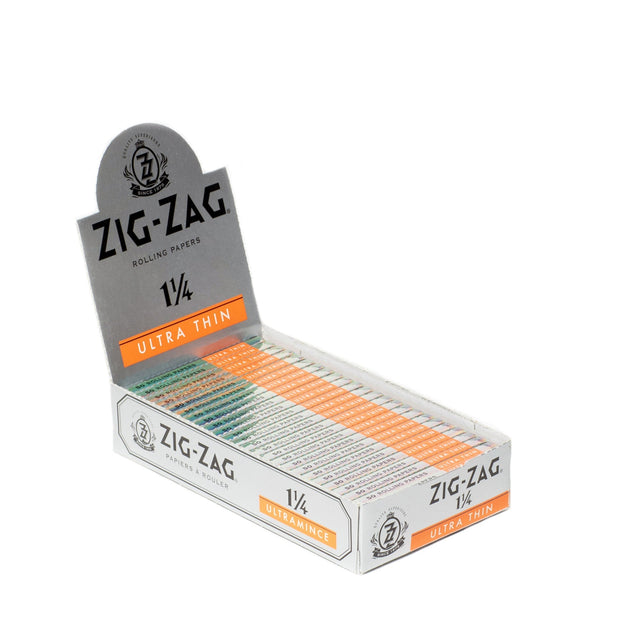 Zig-Zag 1 1/4 Ultra Thin Rolling Paper box, showcasing translucent, lightweight papers designed for a slow, even burn and superior smoking experience.