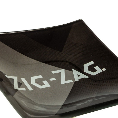 Shatter Resistant Glass Ashtray - Black with white Zig-Zag logo, designed for tabletop use, complements black rolling trays and accessories, ensuring style and functionality.