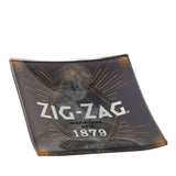 Shatter Resistant Glass Ashtray - Smokey: A square glass ashtray with a logo, designed for durability, perfect for tabletop use while smoking.