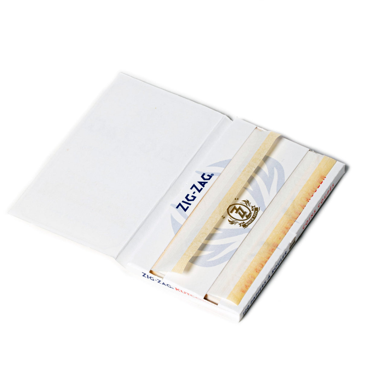 Single Wide White Kutcorners Rolling Paper in a white box, featuring a close-up of the Zig-Zag logo, known for its slow-burning, thin paper.