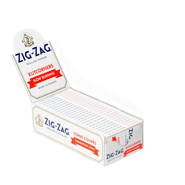 Single Wide White Kutcorners Rolling Paper box with visible Zig-Zag branding, featuring thin-weight papers for easy rolling and slow burning.