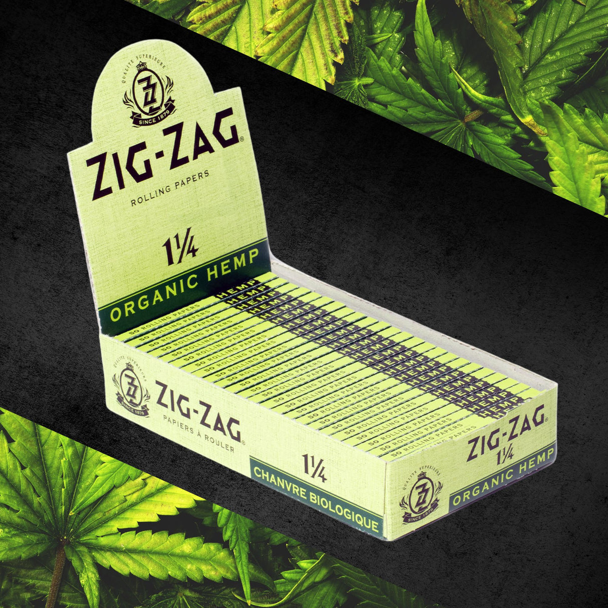 1 1/4 Hemp Rolling Paper box with visible green and yellow label, featuring Zig-Zag logo, highlighting organic hemp fibers for an eco-friendly smoking experience.