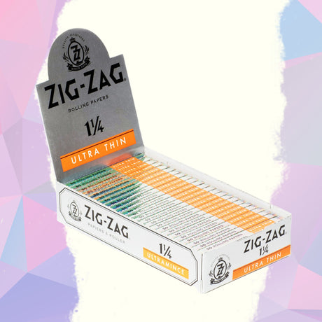 1 1/4 Ultra Thin Rolling Paper by Zig-Zag, featuring a box of translucent, lightweight rolling papers designed for a premium, slow-burn smoking experience.