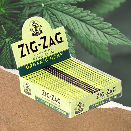 King Slim Hemp Rolling Paper box on a table, highlighting sustainable, non-GMO hemp fibers for a smooth, eco-friendly smoking experience. Includes 25 booklets, 32 papers each.