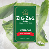 Single Wide Green Rolling Paper box with white text, featuring Zig-Zag's logo, ensuring durability and smooth smoking with wetproof, thicker construction for a prolonged burn.